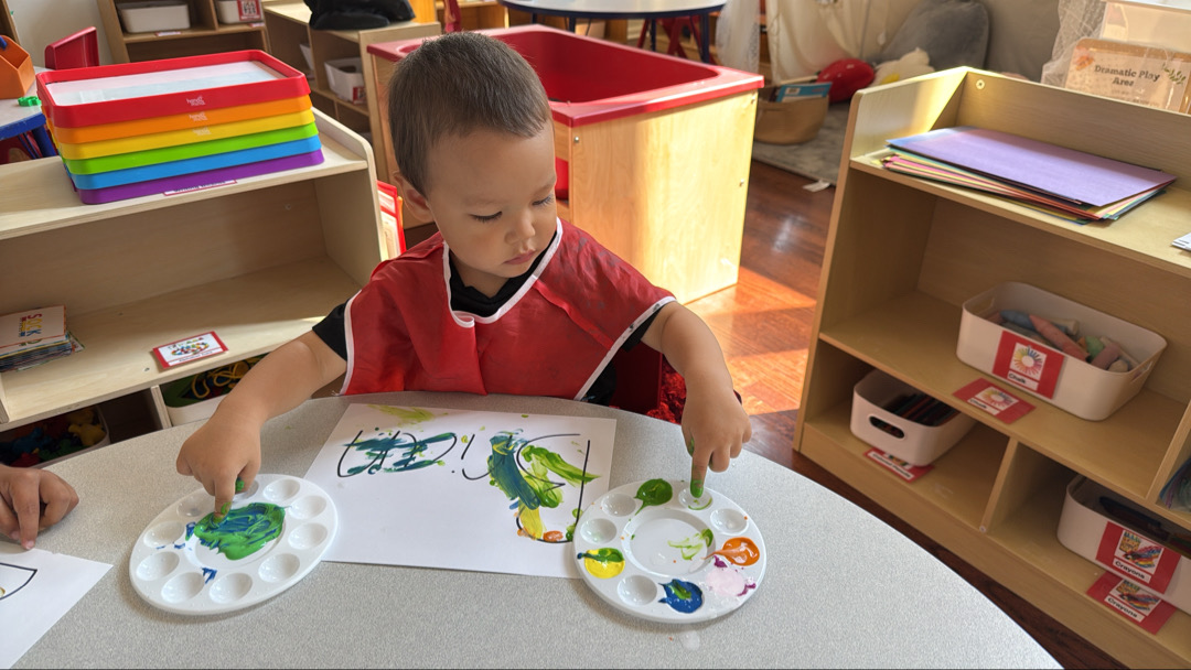 Child playing with paint