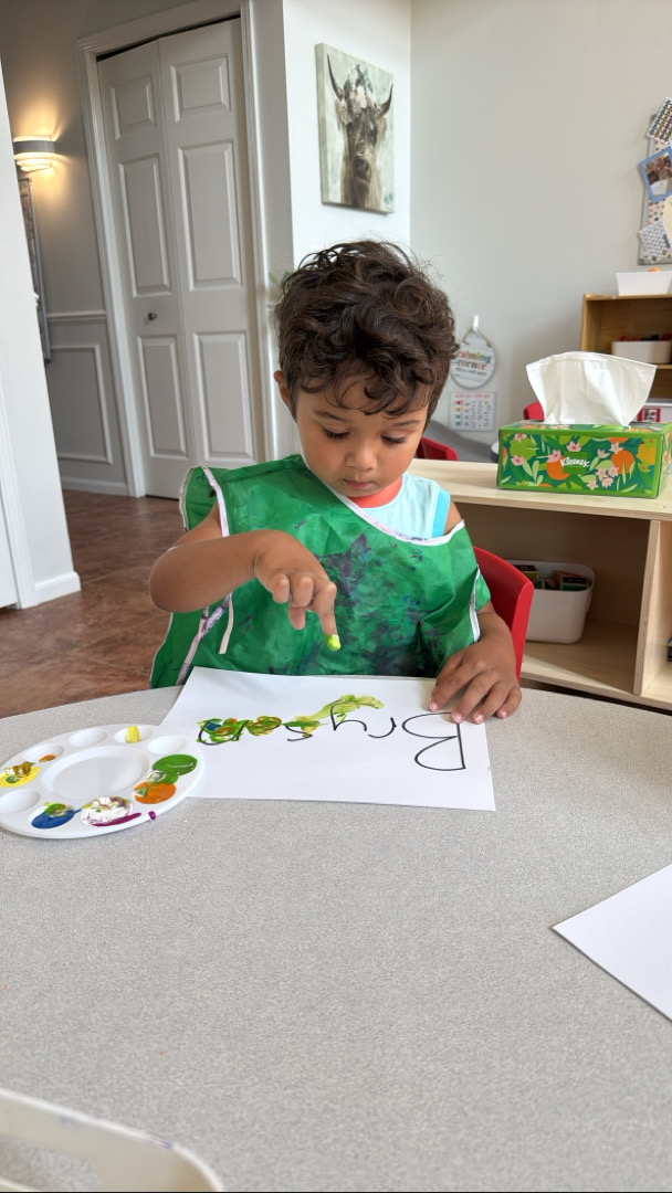 Child playing with paint